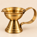 KARNIKAA puja accessory image – Antique Brass Diya Cupwith Curved Handle