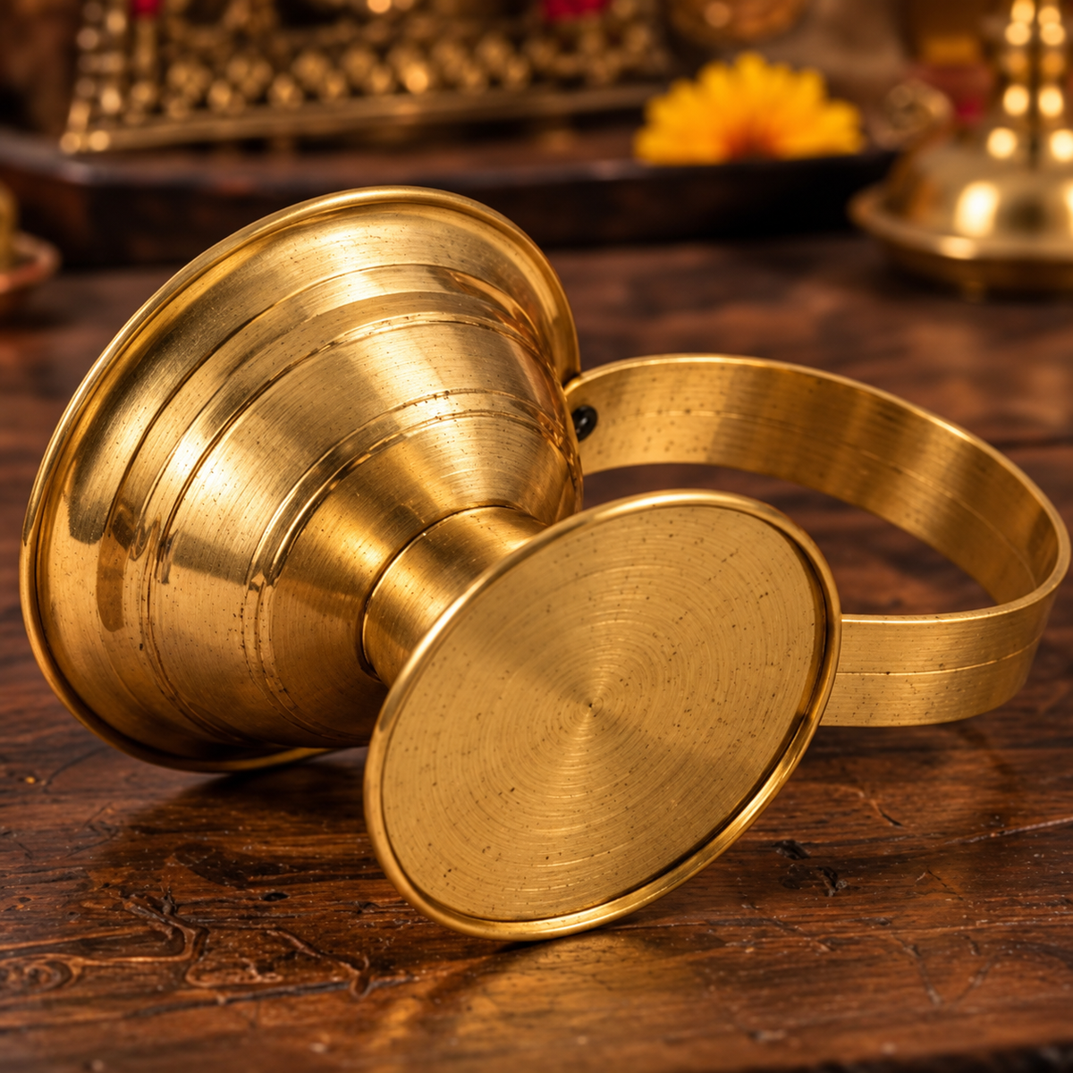 KARNIKAA puja accessory image – Antique Brass Ritual Vesselon Carved Wood